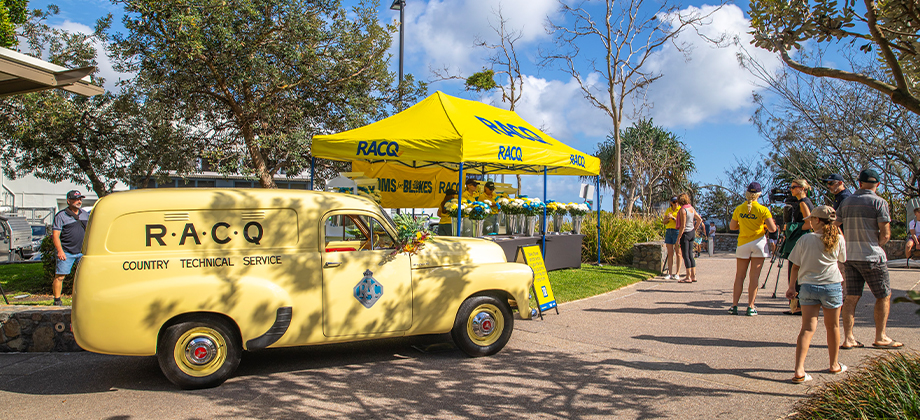 people outside blooms for blokes car setup