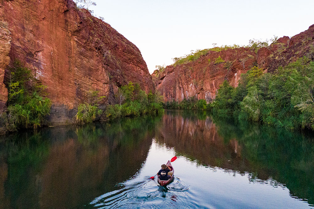 A lone paddler on Lawn Hill Gorge, Boodjamulla National Park.
