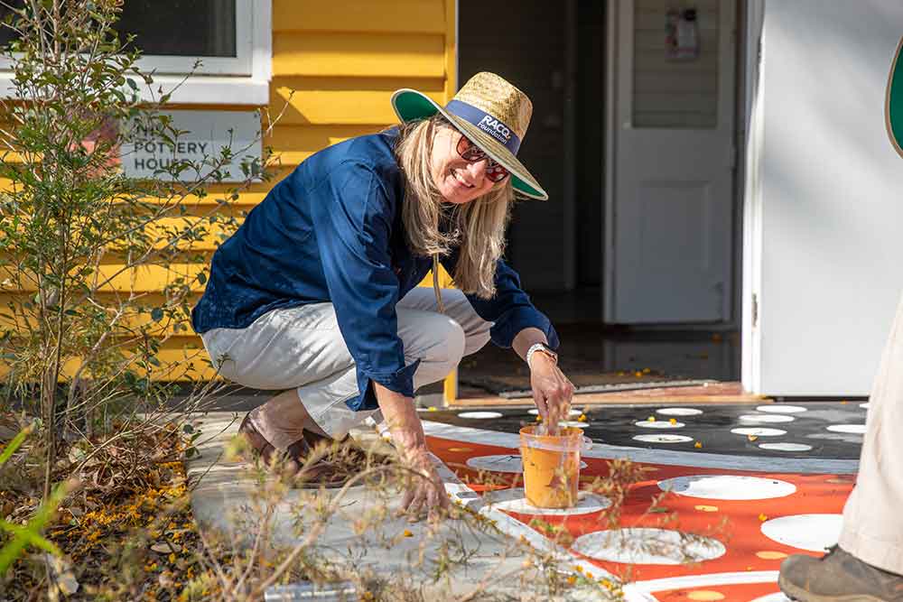 RACQ president Leona Murphy volunteering at Cherbourg with RACQ Foundation.
