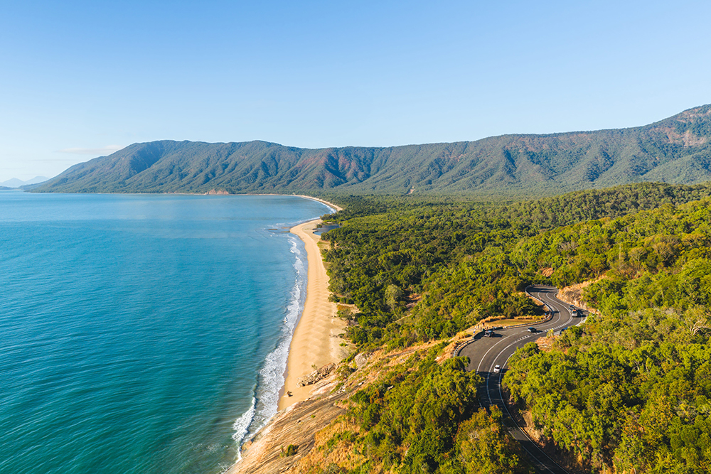 Aerial view of Great Barrier Reef Drive winding along the Wangetti coastline near Rex Lookout in Tropical North Queensland