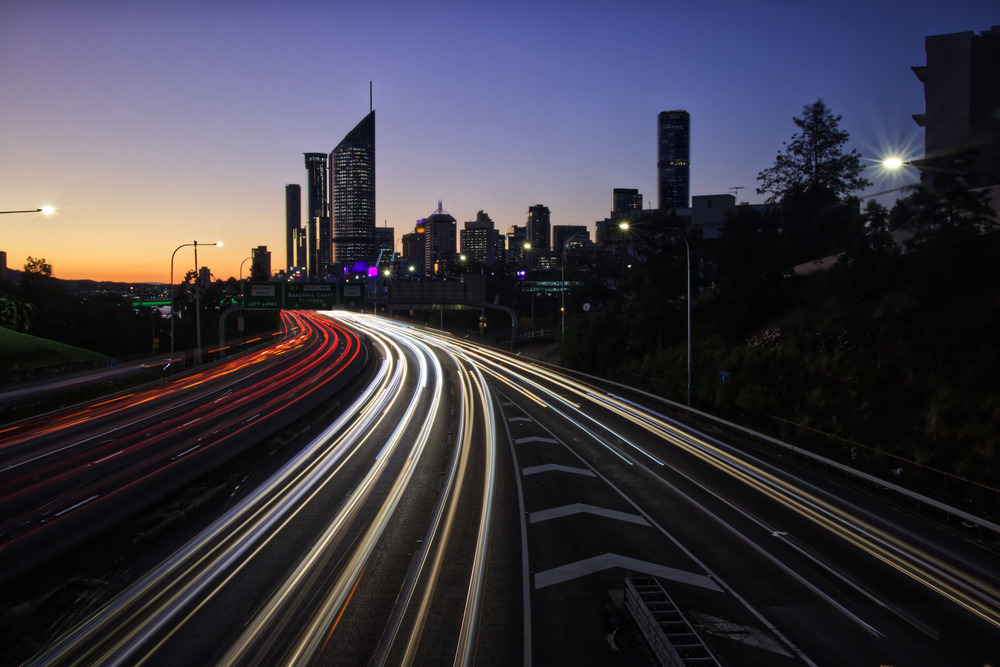 Brisbane motorway with sunset and traffic