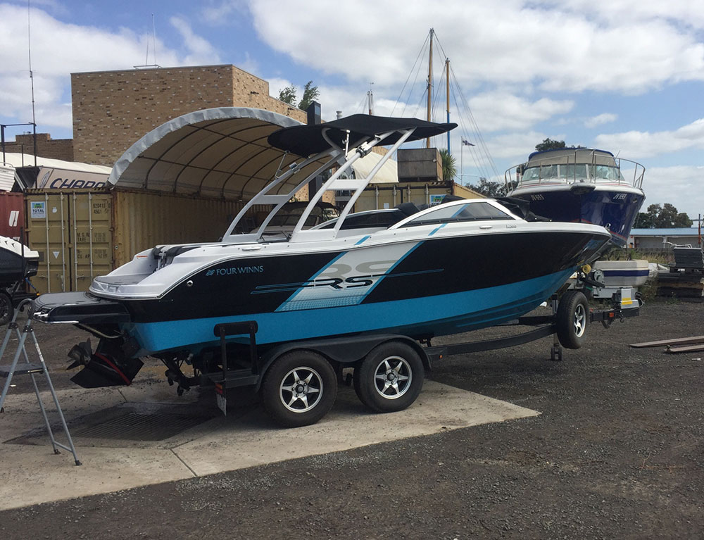 A powr boat on a trailer.