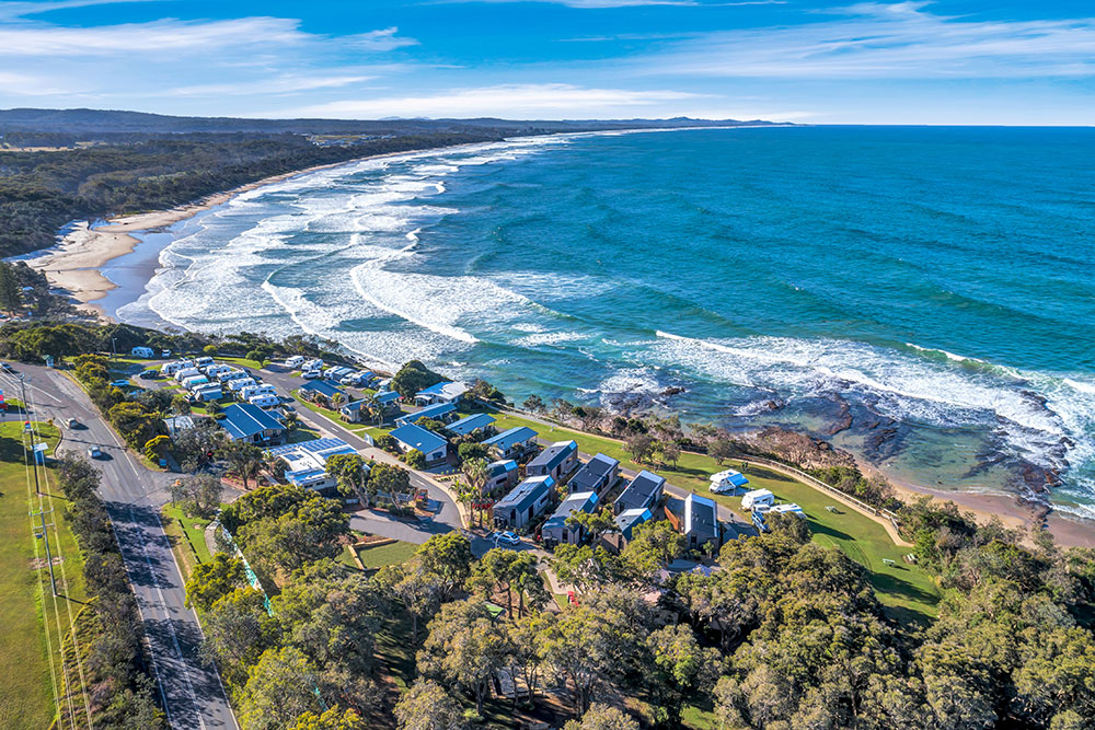 Aerial view of Bonny Hills Holiday Park overlooking Rainbow Beach.