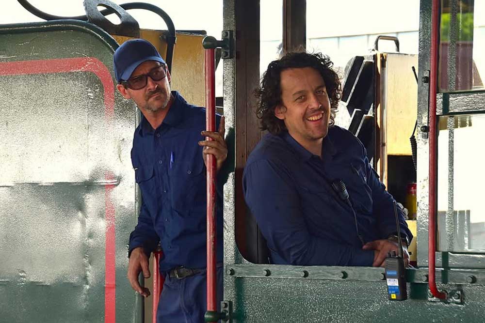 DownsSteam volunteers driving one of their engines.