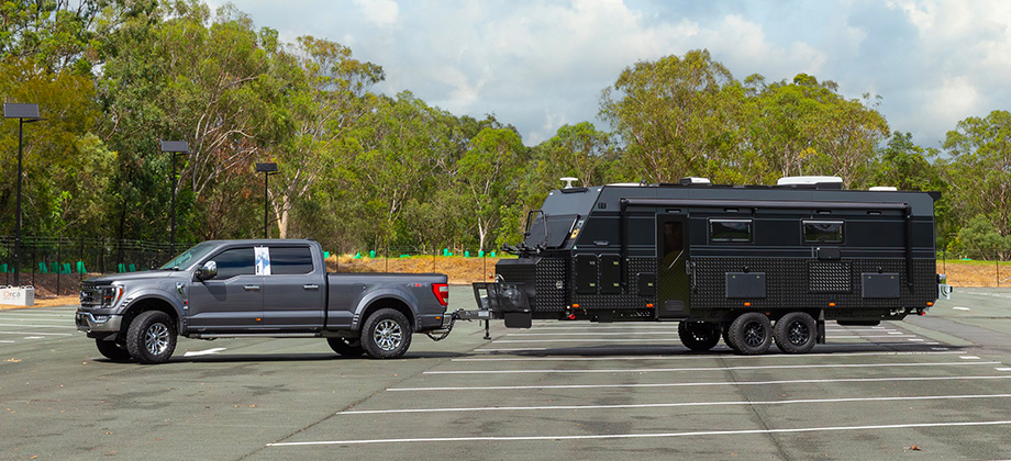 RACQ Mobility Centre Caravan and car in parking lot