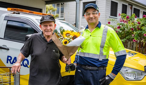 racq member given flowers by racq staff